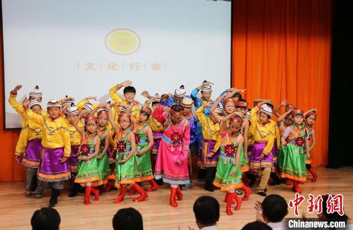 圖為蘭州大學(xué)文化行者團(tuán)隊(duì)走進(jìn)民族社區(qū)，開展系列活動(dòng)。(資料圖)蘭州大學(xué)供圖